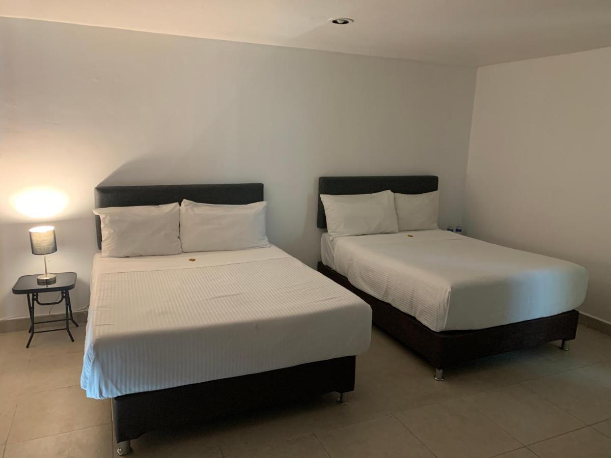 Hotel Escala Puebla Centro Bagian luar foto